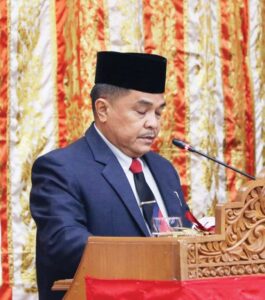 Asisten II Sekdaprov Beni Warlis menyampaikan sambutan gubernur sumbar