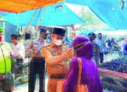 Pedagang Pasar Tiku Diajak Perangi Covid-19