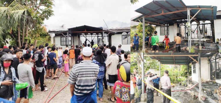 KEBAKARAN— Petugas Damkar melakukan penyemprotan air untuk memadamkan api yang membakar rumah milik penisunan Kantor Pos.