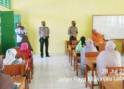 Polisi Tan­jung Raya Ingatkan Penerima Bansos Patuhi Prokes