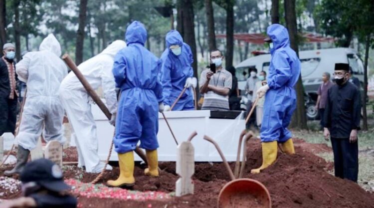 Ilustrasi pemakaman jenazah pasien Covid-19