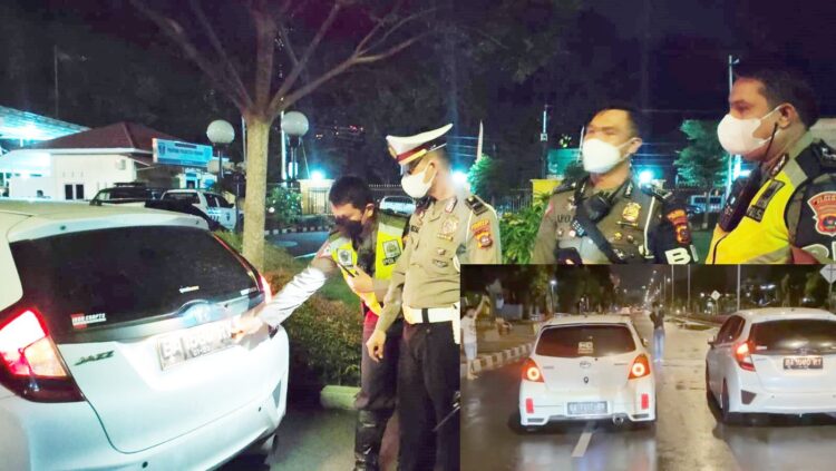 BALAP— Tangkapan layar video dua mobil yang adu balap di Jalan Khatib Sulaiman dan viral di Media Sosial. Sementara, Polisi berhasil menemukan salah satu mobil dan langsung mengandangkannya.