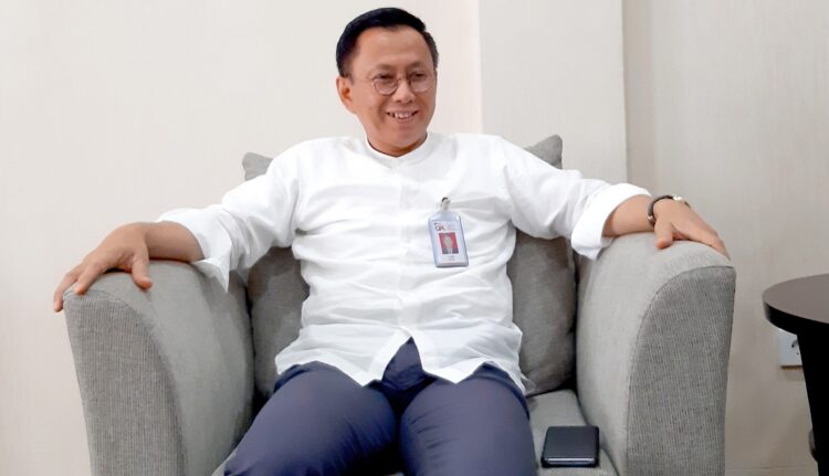 Yusri  Kepala OJK Sumbar