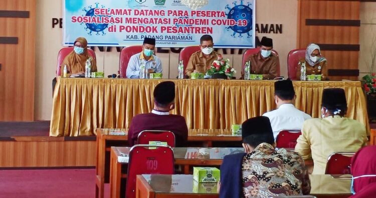 SOSIALISASI—Dinas Kesehatan Kabupaten Padangpariaman bersama Baznas dan Kemenag Padangpariaman saat sosialisasi pencegahan Covid-19.
