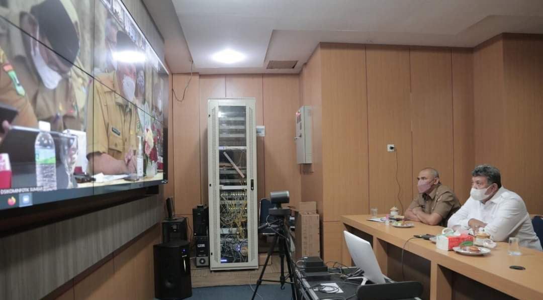 Mengikuti vidcom dalam upaya percepatan pelaksanaan vaksinasi