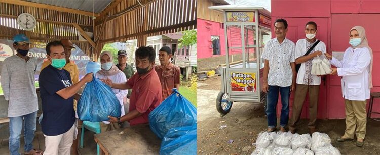 Andre Rosiade ”Traktir” Makan Siang Korban Banjir Kototangah dan Nanggalo 1 BANTUAN NASI BUNGKUS— Pengurus Gerindra menyerahkan bantuan nasi bungkus dari Andre Rosiade kepada korban banjir di Nanggalo dan Kototangah, Kamis (30/9).