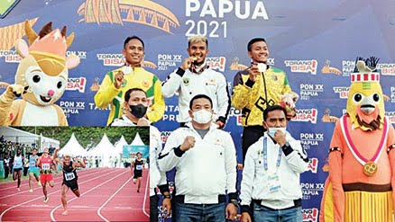 Raih Emas Nomor Dasa Lomba Atletik, Fauma jadi “Manusia Terkuat” di Arena PON Papua 1 Fauma Depril Jumra, atlet Sumbar asal Kabupaten Pasaman, menggigit medali emas saat naik podium