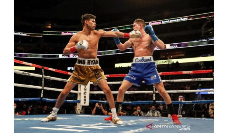 Bintang tinju kelas ringan dunia Ryan Garcia melalui media sosial Twitter, menantang George Kambosos Jr yang baru saja menjadi juara dunia WBA Super, IBF, WBO, dan The Ring setelah mengalahkan Teofimo Lopez, Minggu (28/11).