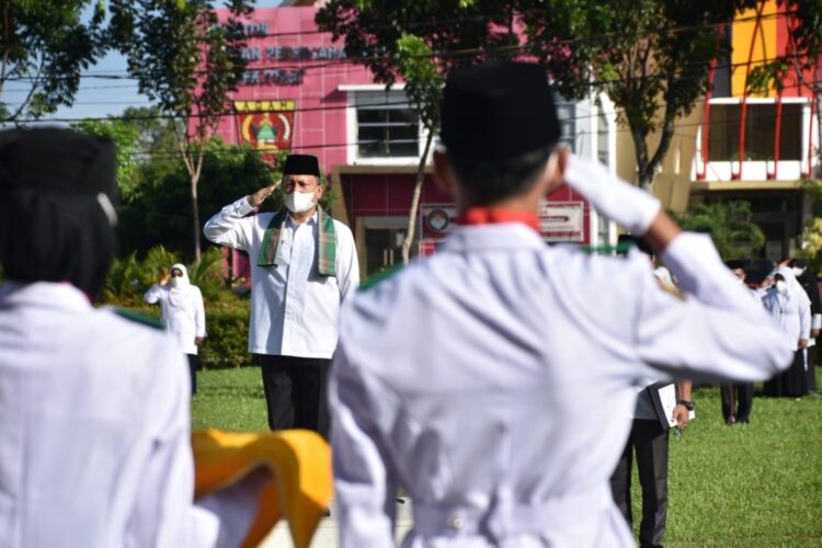 Wakil Bupati Agam, Irwan Fikri Dt Parpatiah jadi Irup HAB Kemenag ke-76, Dia menyampaikan amanat Menteri Agama.