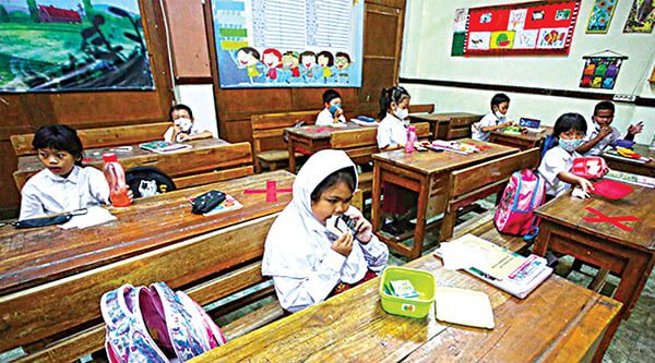 ILUSTRASI— Siswa SD saat pembelajaran tatap muka (PTM) di sekolah.