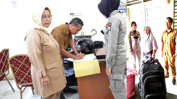TERLANTAR— Satpol PP Padang menyelamatkan seorang ibu-ibu asal Deli Serang, Sumut yang diduga terlantar di loket NPM, Selasa (2/8).