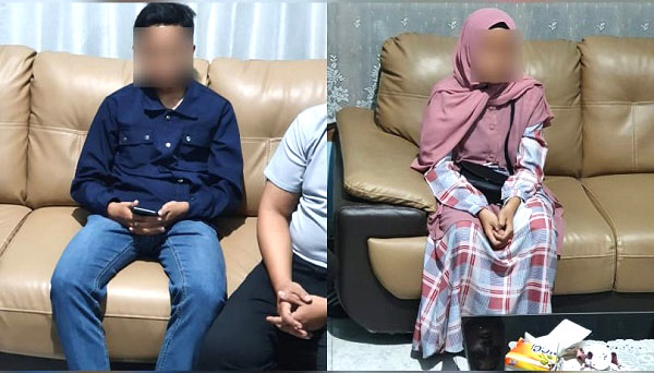 TETANGKAP MESUM—Pasangan mahasiswa yang diduga mesum di toilet musala ditangkap warga dan dibawa ke Polsek Pauh.