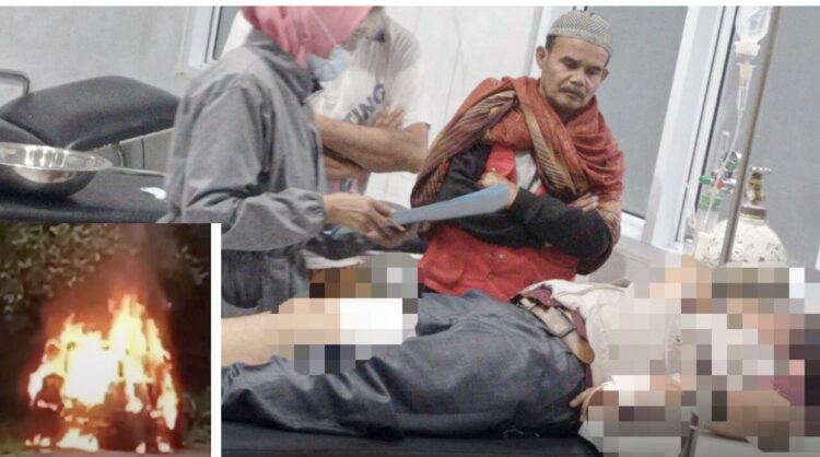 DIRAMPOK— Korban Man Ujang (47) dirawat di RS Achmad Mochtar Bukittinggi usai dirampok dan ditembak. Sementara, mobil pelaku ditinggal lalu terbakar.