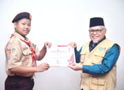 Sukses Ikuti Jamnas XI di Cibubur, Ketua Kwarcab Sawahlunto Serahkan Kontingen Pramuka