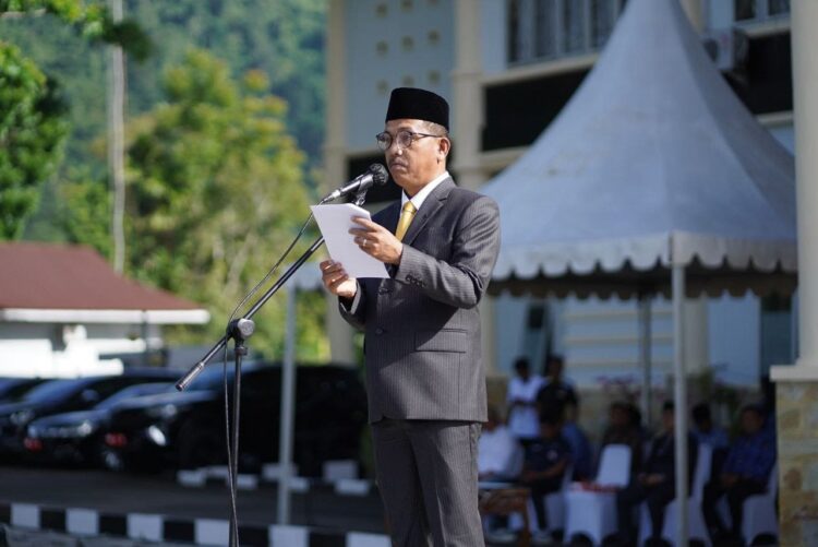 SAMBUTAN—Bupati H. Khairunas saat berikan sambutan dalam upacara Peringatan Hari Kebangkitan Nasional ke-115 Tingkat Kabupaten Solok Selatan.