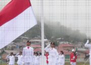 Diguyur Hujan Deras, Upacara Penurunan Bendera Digelar Tanpa Pasukan