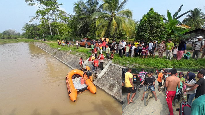 EVAKUASI— 
Bocah 2 tahun yang tewas tenggelam di saluran irigasi aliran Sungai Batang Hari, Kecamatan Pulau Punjung, Kabupaten Dharmasraya, dievakuasi usai ditemukan.