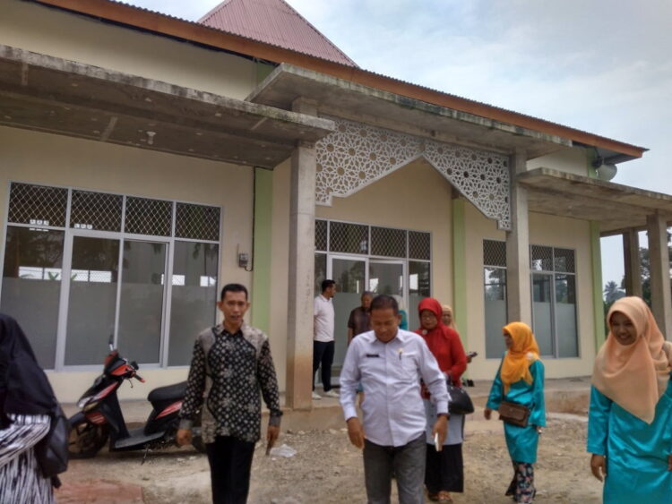 TIM PENILAI— Para tim penilai saat berada di lapangan untuk melakukan penilaian.