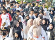 Bartabur Ratusan Doorprize, Ribuan ASN Ikuti Jalan Santai Peringati HUT KORPRI ke-52