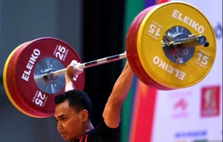 LIFTER INDONESIA— Lifter Indonesia Eko Yuli Irawan meraih medali perak di ajang IWF Grand Prix II 2023 Grup B kelas 61 kilogram putra, di Doha, Qatar, Rabu (6/12) malam atau Kamis (7/12) dini hari WIB.