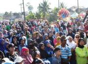 Anniversary Aciak Mart ke-12 Bertabur Doorprize, Hadiah Utama Umroh Diterima oleh Silvi Herlina