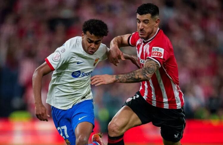 Athletic Bilbao Singkirkan Barcelona dari Kompetisi Copa Del Rey 1 DUEL— Pemain muda Barcelona Yamine Yamal berusaha melewati hadangan pemain Bilbao saat kedua tim bersua pada perempat final Copa Del Rey, Kamis (25/1) dini hari WIB.