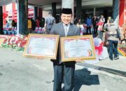Peringatan Hari Pendidikan Nasional dan Hari OTDA, Kabupaten Agam Raih Dua Penghargaan Bergengsi