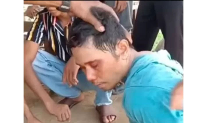 PERAMPOK—Satu pelaku perampokan pedagang emas di Kabupaten Limapuluh Kota yang ditangkap di Desa Cipang Kiri Hilir, Kecamatan Rokan IV Koto, Kabupaten Rokan Hulu, Provinsi Riau.