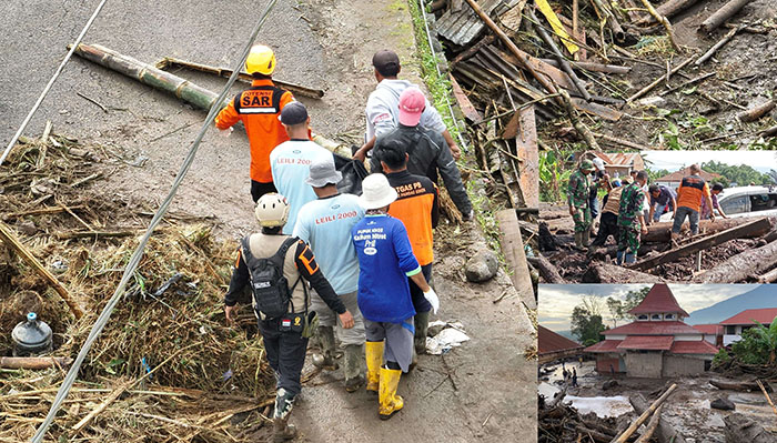 KORBAN BANJIR— Tim SAR mengevakuasi korban banjir bandang yang ditemukan meninggal dunia.
