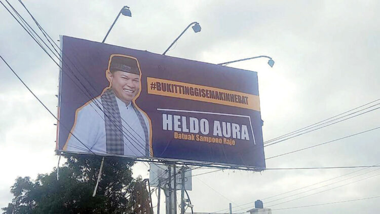 Mantan Ketua KPU Bukittinggi Heldo Putra, Kandidat Kuat Dampingi Erman Safar di Pilkada 2024 1 BALIHO— Baliho Heldo Putra yang ada di salah satu sudut Kota Bukittingi. Heldo Putra disebut-sebut menjadi kandidat kuat menjadi Wakil Erman Safar di Pilkada 2024.