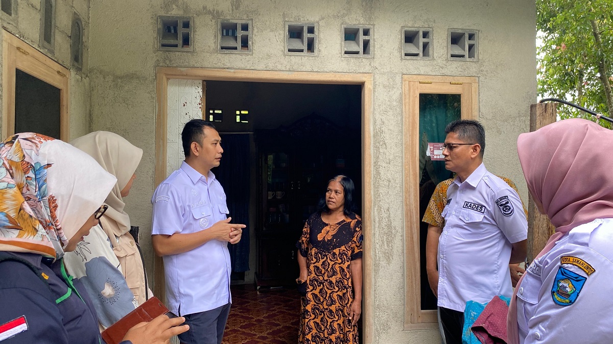 Camat Silungkang Andi Eka Putra bersama tim saat turun ke lapangan Melaku Verifikasi dan Validasi data