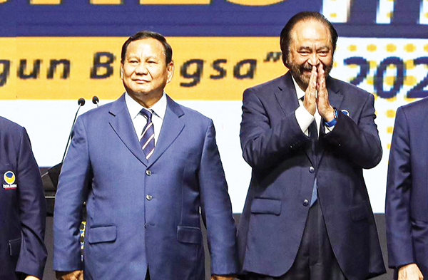 Tak Masuk Kabinet Prabowo-Gibran, Nasdem Sebut Bukan Berarti Oposisi 1 DAMPINGI— Ketua Umum Partai NasDem Surya Paloh mendampingi Presiden terpilih Prabowo Subianto saat menghadiri Penutupan Kongres III Partai NasDem di Jakarta, Selasa (27/8).