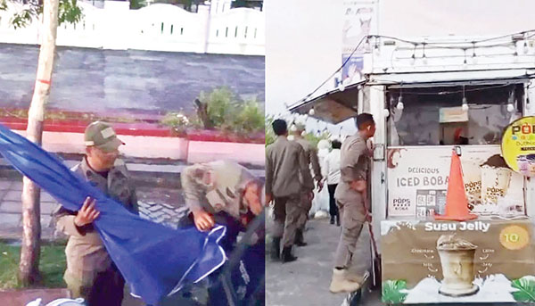 Penertiban di Pantai Muaro Lasak dan TMP Lolong, 10 Kursi, 11 Payung dan Banner Milik PKL Diangkut 1 LANGGAR ATURAN— Petugas Satpol PP mengangkut sejumlah kursi, belasan payung hingga banner jualan milik PKL yang melanggar aturan dengan berjualan di atas fasum dan badan jalan, Kamis (31/10) sore.