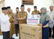 Pemkab Agam dan BAZNAS Salurkan ZIS Tahap II di Agam Timur