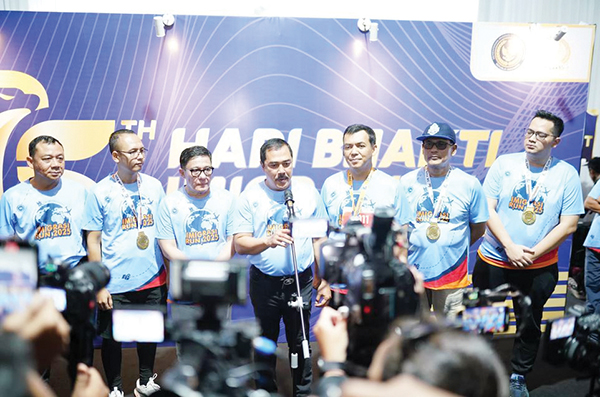 Imigrasi Akan Luncurkan Paspor Baru, Desainnya Sesuai Standar Internasional 1 KONFERENSI PERS— Menteri Imigrasi dan Pemasyarakatan (Imipas) Agus Andrianto di kawasan GBK, Senayan, Jakarta, Minggu (19/1).