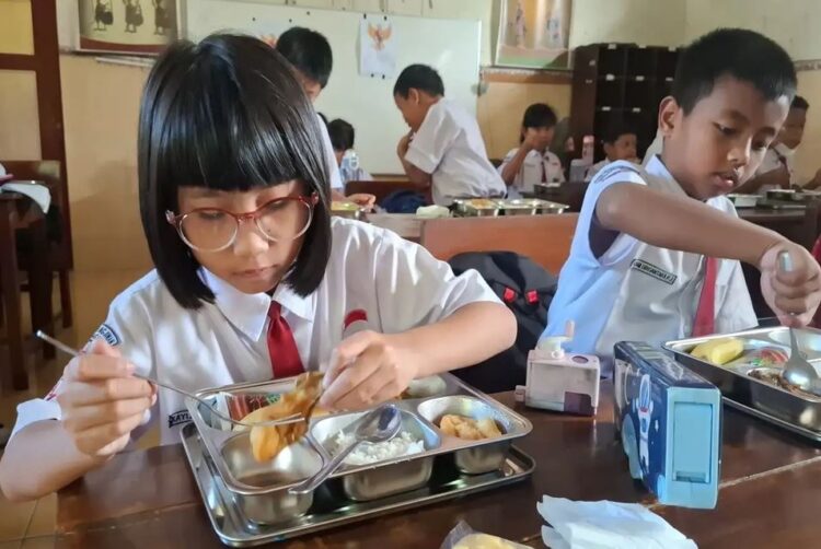 Uji Coba MBG Dimulai 13 Januari, 6 Sekolah akan Jadi Percontohan 1 ILUSTRASI— Uji coba program MBG bagi siswa SD.