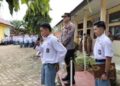 Kapolsek Pancung Soal Jadi Pembina Upacara di SMKN 1, Sosialisasikan Program Kapolda Sumbar 11 Kapolsek Pancung Soal Jadi Pembina Upacara di SMKN 1, Sosialisasikan Program Kapolda Sumbar