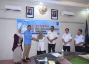 Pj Wako Fauzan Hasan, Hadiri Penyerahan KKPD dari Bank Nagari dan Bank Mandiri