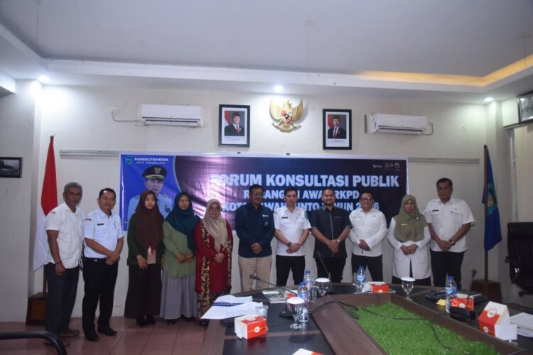 Untuk Penyusunan Pembangunan yang Lebih Partisipatif, FKP Rancangan RKPD Tahun 2026 Digelar 1 USAI—Pj Wako Sawahlunto Fauzan Hasan usai pembukaan foto bersama.