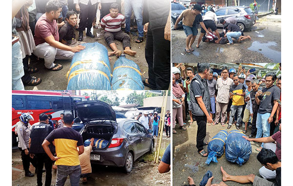 Honda Brio Disergap, Dua Kurir Ditangkap, Diblokade di Depan SPBU, Bawa 26 Kg Ganja, Ngaku Terima Upah Rp 300 Ribu Per Kg 1 GANJA— Dua kurir yang kedapatan membawa
26 Kg ganja ditangkap Tim Ditresnarkoba Polda Sumbar bersama Polres Pasbar di depan SPBU Batang
Toman, Kecamatan Pasaman.