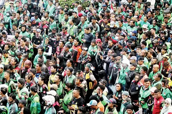 Sejumlah Kota Besar Diprediksi bakal Lumpuh, 500.000 Pengemudi Ojek dan Taksi Online Siap Gelar Unjuk Rasa 1 ILUSTRASI— Demo ojek online.