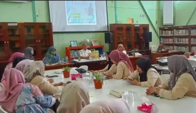 Membaca Nyaring Bisa Tingkatkan Pemahaman Literasi Anak 1 MEMBACA NYARING—Kepala Dinas Perpustakaan dan Kearsipan Sawahlunto Jon Hendri dan Kepala Bidang Perpustakaan Nova Zahara menghadiri Bimbingan Teknis Membaca Nyaring.