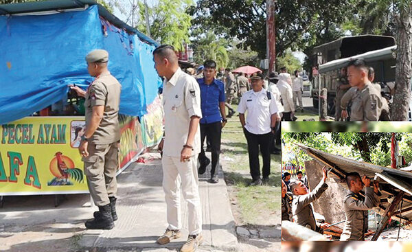 PEMBONGKARAN BANGLI— Petugas Satpol PP Kota Padang membongkar bangunan liar (bangli) dan menertibkan Pedagang Kaki Lima (PKL), di jalan Adinegoro, Kecamatan Kototangah, Kamis (12/6).