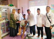 BAZNAS Bukittinggi Serahkan Kursi Roda Kepada Imam Irhabi