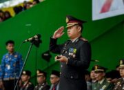 Kapolres AKBP M Faisal Pimpin Upacara Penurunan Bendera di Solsel