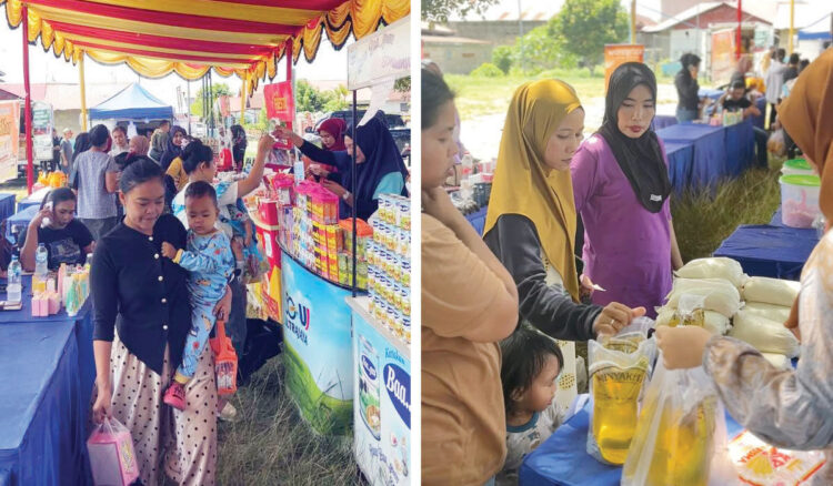 KUNJUNGI PASAR MURAH— Warga terlihat antusias untuk berbelanja di Pasar Murah yang digelar Pemko Padang di di Lapangan Volly, Jalan Bahagia, Ulak Karang Selatan, Kecamatan Padang Utara, Rabu (15/10).