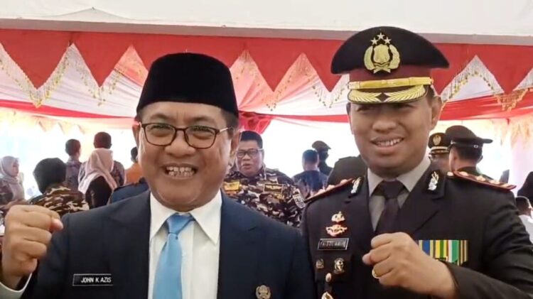 TNI Garda Terdepan Penjaga Kedaulatan Bangsa, Pelindung Rakyat dan Perekat Persatuan 1 BERSAMA—Bupati Padangpariaman, John Kenedy Azis, bersama Kapolres AKBP Ahmad Faisol Amir SIK MSi saat menghadiri upacara peringatan Hari Ulang Tahun (HUT) ke-80 Tentara Nasional Indonesia (TNI).