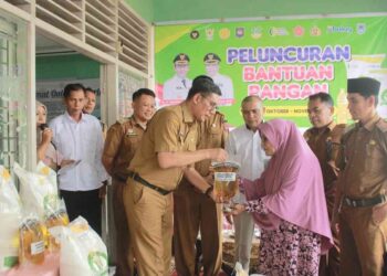 7.099 KK Terima Bantuan Pangan Pemerintah, Tiap Keluarga Terima20 Kg Beras dan 4 Liter Migor