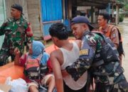 Berkolaborasi dengan Tim Daerah, Babin Potmar Selamatkan 40 Orang Warga dari Kepungan Banjir