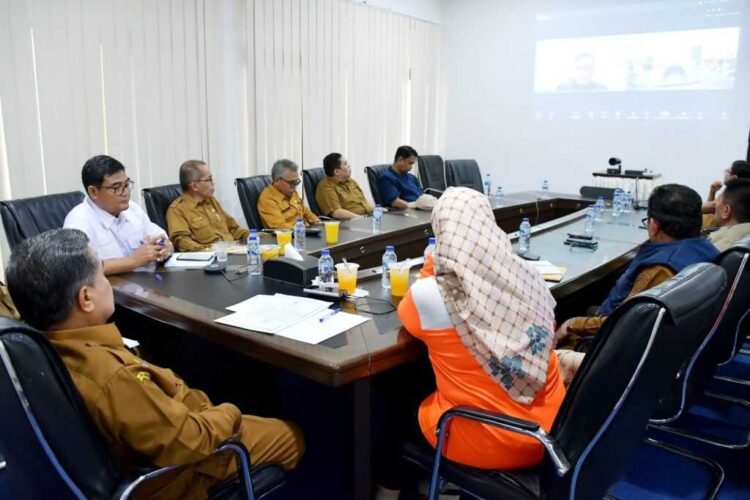 Penanganan Huntara Korban Terdampak Bencana, Pemkab Agam Usulkan Dua Skema ke BNPB 1 ZOOM MEETING— Pemkab Agam mengikuti zoom meeting bersama BNPB bahas rencana pembangunan huntara untukl korban bencana di Sumbar.
